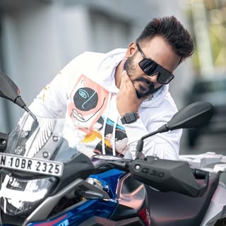 Hussain S K